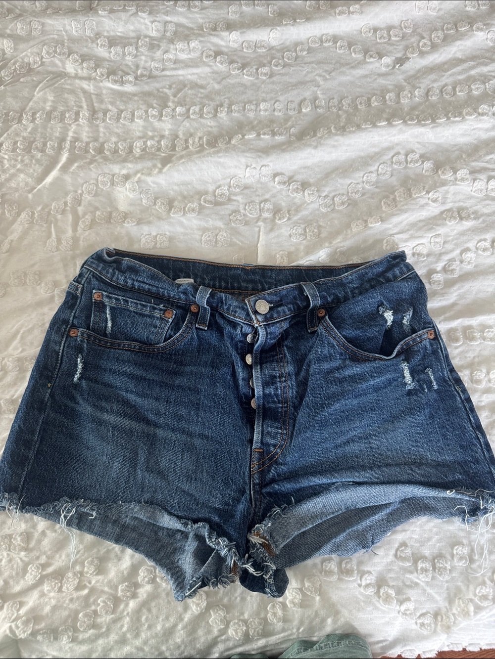 Levi’s Dark Blue Distressed Denim Shorts
